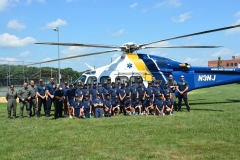 New Jersey State Police hand their helicopter at the Monroe Township Middle School to show the first ever Monroe Township Police Youth Academy class