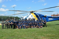 New Jersey State Police hand their helicopter at the Monroe Township Middle School to show the first ever Monroe Township Police Youth Academy class