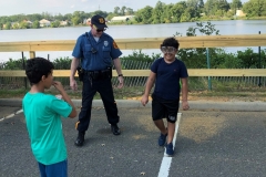 Ofc. Cohn showing children beer goggles
