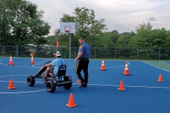 Peddle cars with Ofc. Meagher