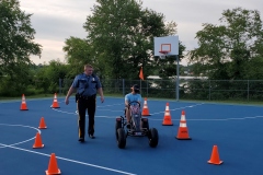 Peddle cars with Ofc. Meagher