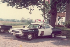 believed to possibly be a 1973 Plymouth Fury police car in the parking lot of the Police Station on Spotswood Englishtown Road
