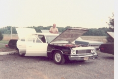 believed to be a 1974 Plymouth Fury police car being outfitted with police equiptment in the parking lot of the police station on Spotswood Englishtown  Road