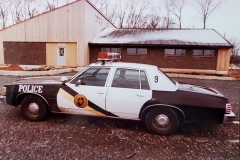 believed to be a late 70's early 80's Pontiac Catalina in the parking lot of the current Police Station